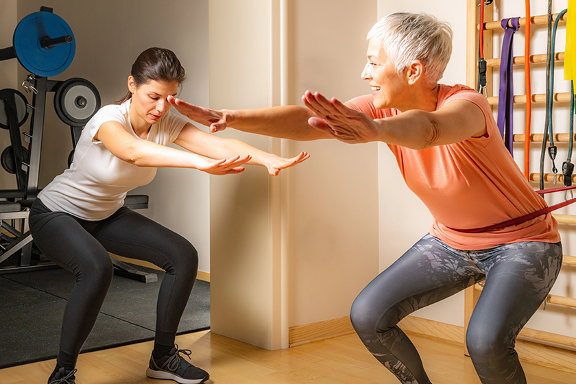 active-senior-woman-doing-squats